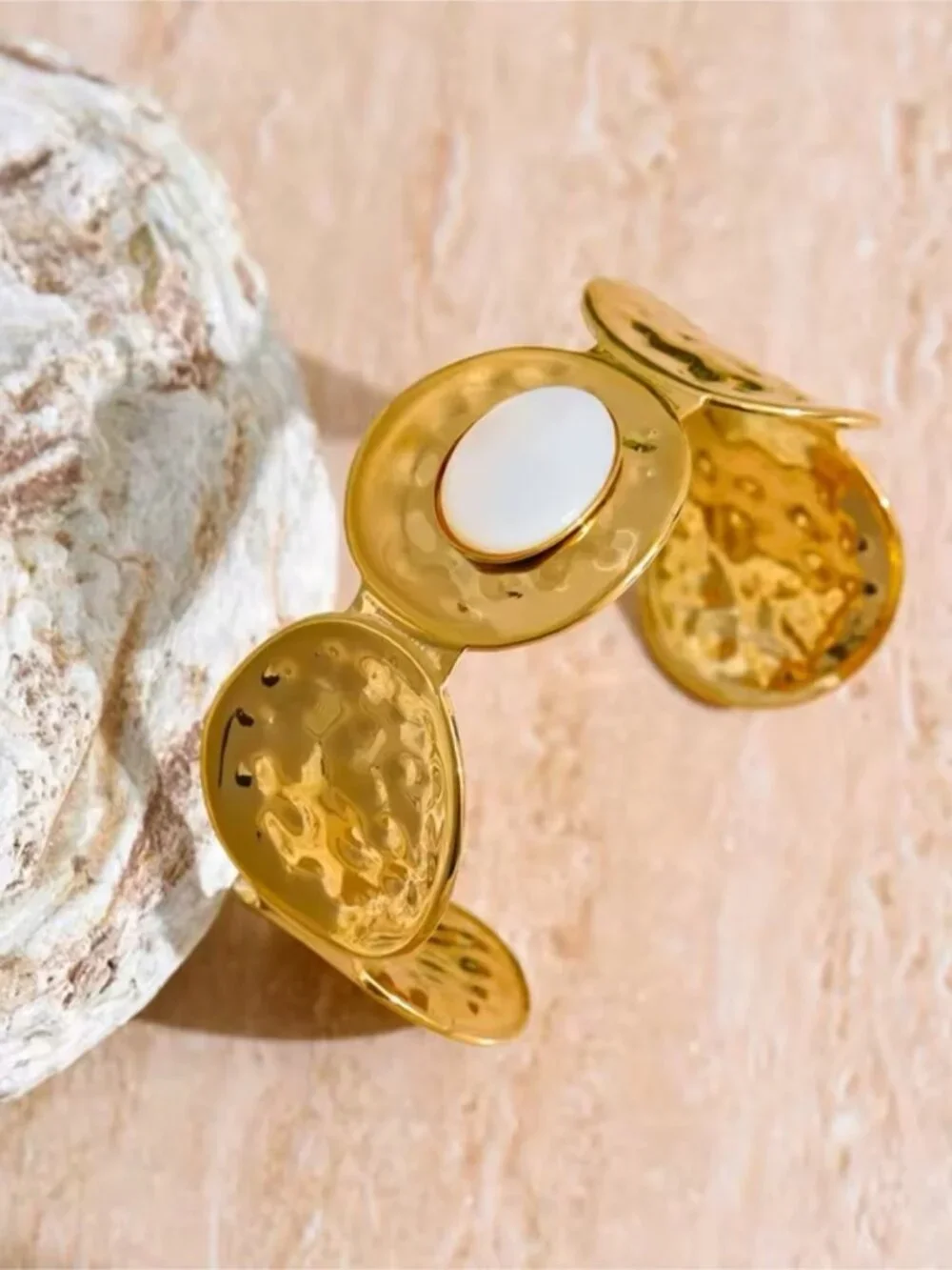 Gold Tone Cuff Bracelet with White Mother-of-Pearl Center